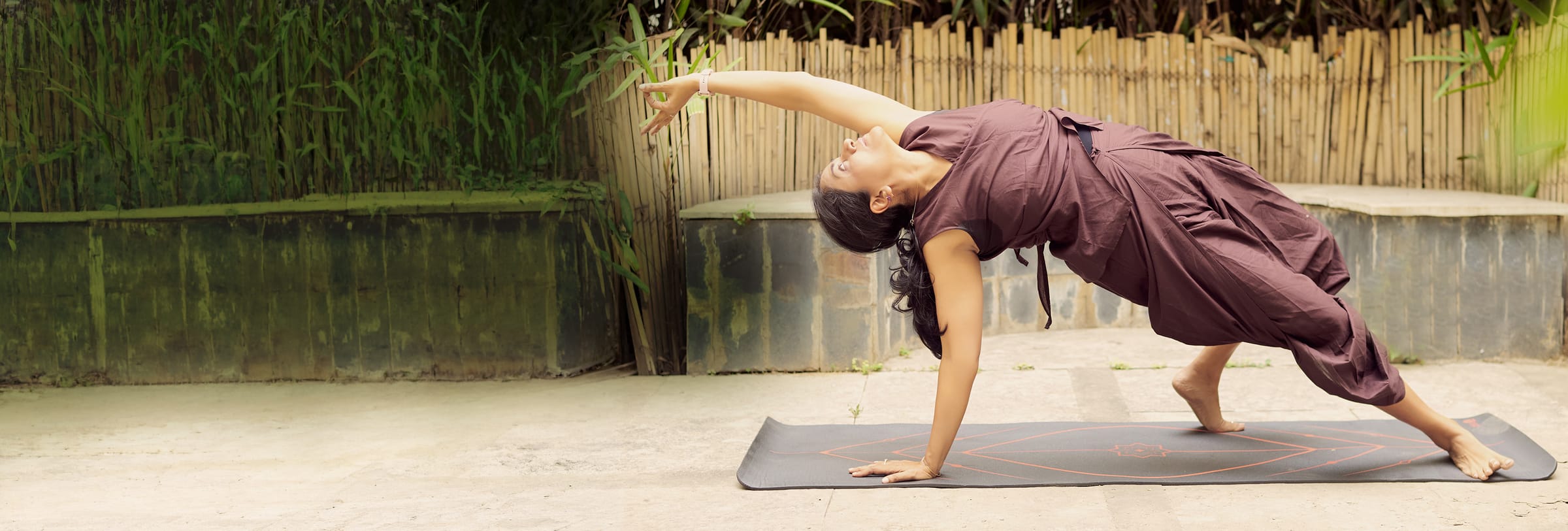 Woman in a backbend yoga pose